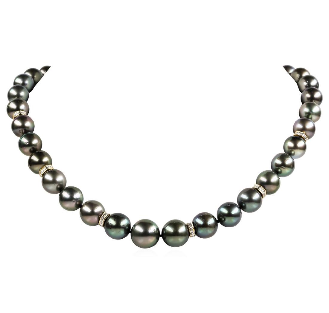 Pearl and Diamond Necklace: One graduated single strand pearl necklace 19.0' princess length, knotted with a tongue clasp & foldover safety containing 35 Tahitian pearls, 14.6mm to 11.0mm in size. The pearls are black in color, 