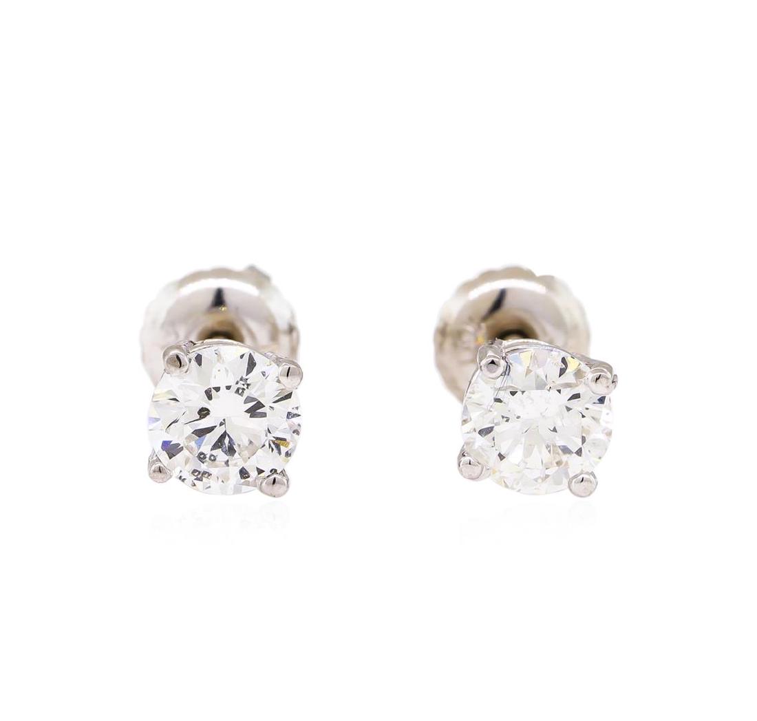 1.08 ctw Diamond Stud Earrings - 14KT White Gold: One pair electronically tested 14KT white gold lady's combination cast & assembled stud earrings with threaded posts and screw-on/screw-off backs with a bright polish finish. Identified with markings
