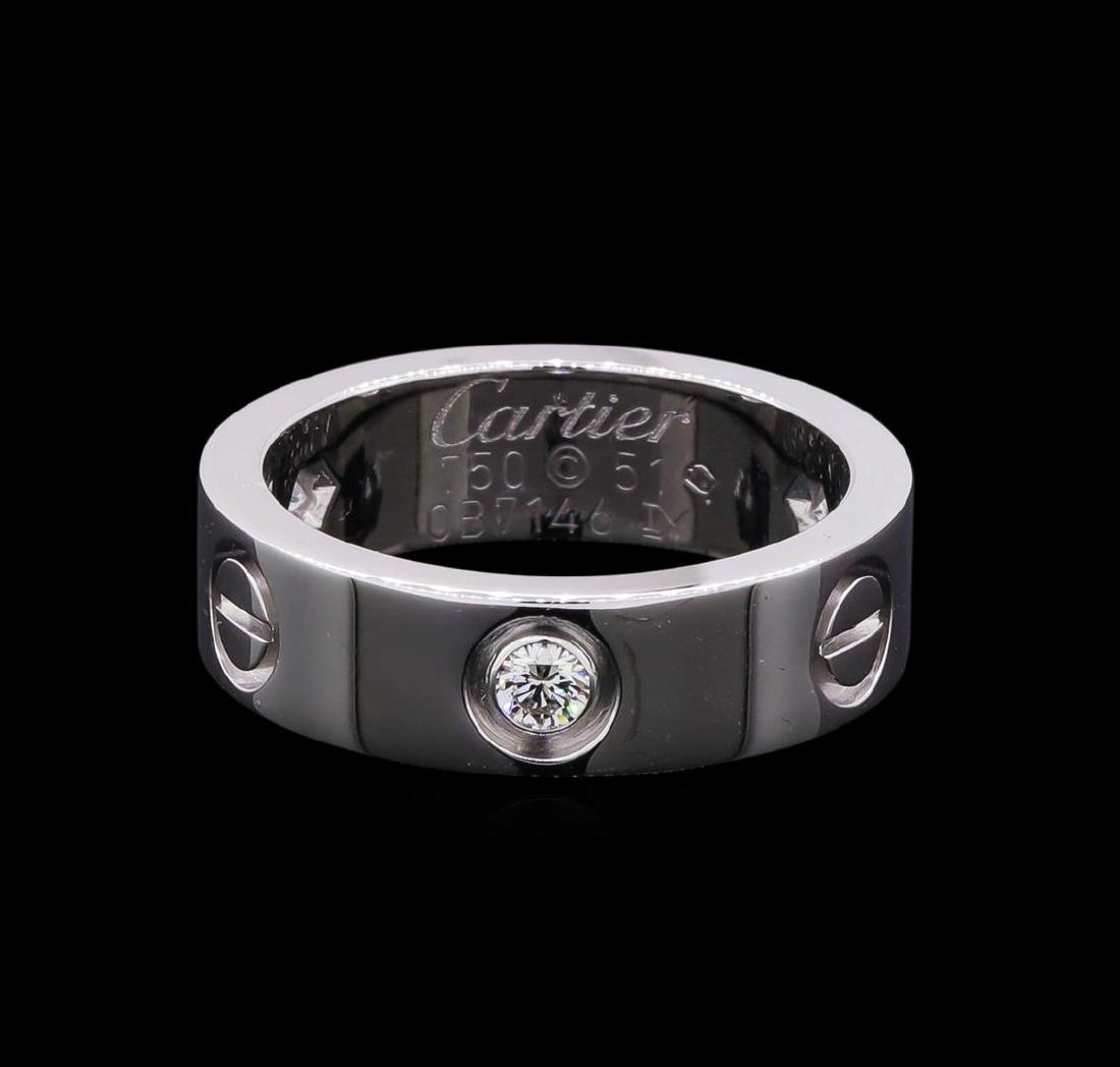 Cartier 18KT White Gold 3 Diamond Love Ring: One Cartier Love ring featuring 18KT white gold containing three diamonds. The ring is stamped Cartier. Size 6. Comes with red Cartier pouch.