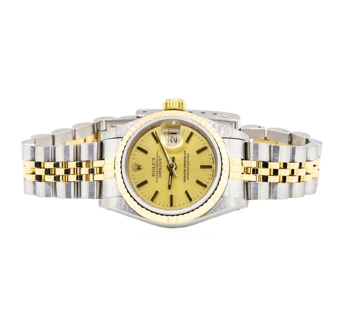 Rolex 18KT Yellow Gold and Stainless Steel Ladie's: One 18KT yellow gold and stainless steel Rolex ladie's oyster perpetual datejust wristwatch with a jubilee bracelet and a case measuring 26mm. The watch is a quickset and has a yellow gold fluted beze