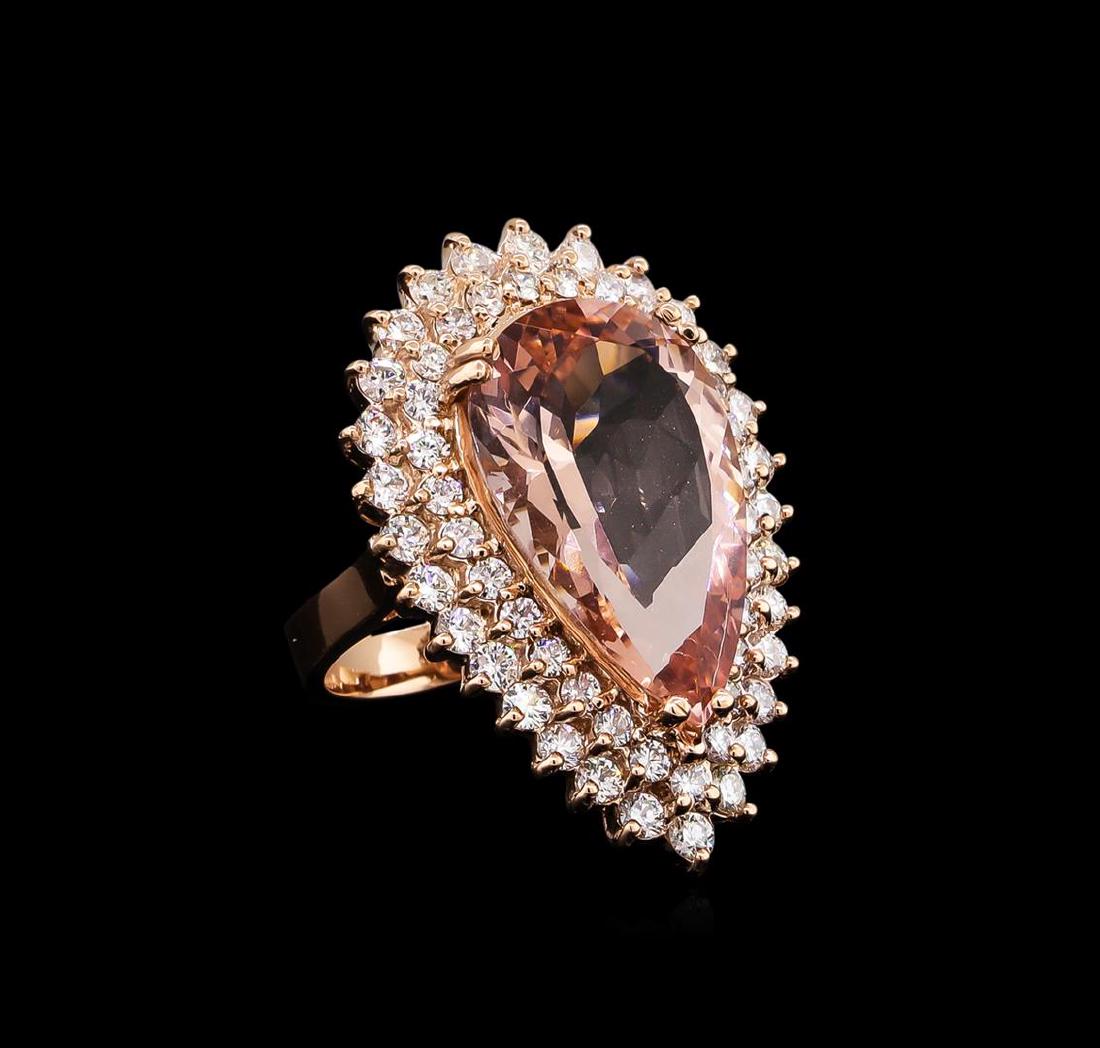 12.50 ctw Morganite and Diamond Ring - 14KT Rose Gold: One electronically tested 14KT rose gold lady's cast fashion ring with a double basket halo with a bright polish finish. The featured lady's ring has a shank measuring 3.44 millimeters wide. Identifie