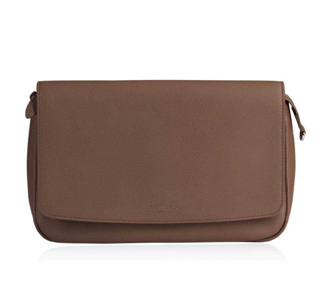 Louis Vuitton Boheme Clutch: One Louis Vuitton Boheme Clutch. This authentic roomy tote epitomizes everyday sophistication and makes a perfect everyday bag, large enough to hold all your essentials in style. The leather handbag m