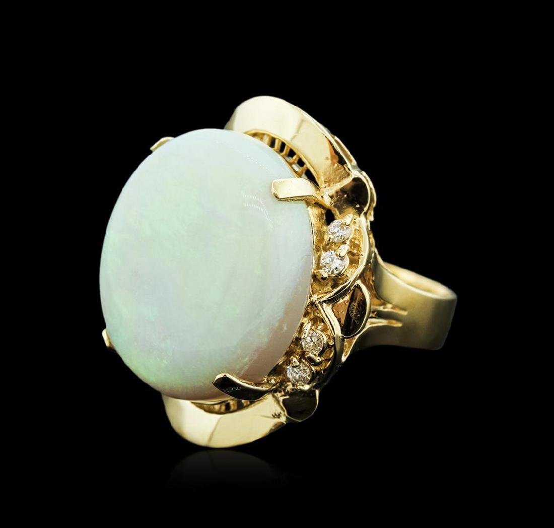 14KT Rose Gold 16.57 ctw Opal and Diamond Ring: One electronically tested 14KT rose gold ladies cast opal and diamond ring with a bright polish finish. Identified with markings of "14K". Condition is new. Containing: Eight prong set round brilliant