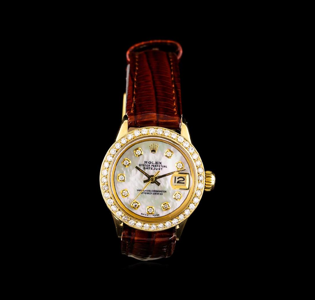 Rolex 18KT Gold Diamond DateJust Ladies Watch: One ladies, hand crafted & machine milled vintage Rolex DateJust model wristwatch electronically tested 18KT yellow gold, Circa: 1967, Swiss Hallmarked Case: 25mm oyster, Crown: twinlock with logo, no