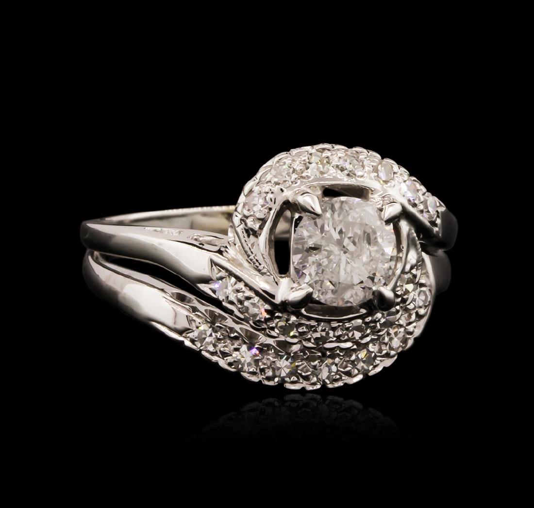 14KT White Gold 0.85 ctw Diamond Ring: One electronically tested 14KT white gold ladies cast diamond engagement ring with a bright polish finish. Identified with markings of "14K". Condition is new. Containing: One prong set round brillian
