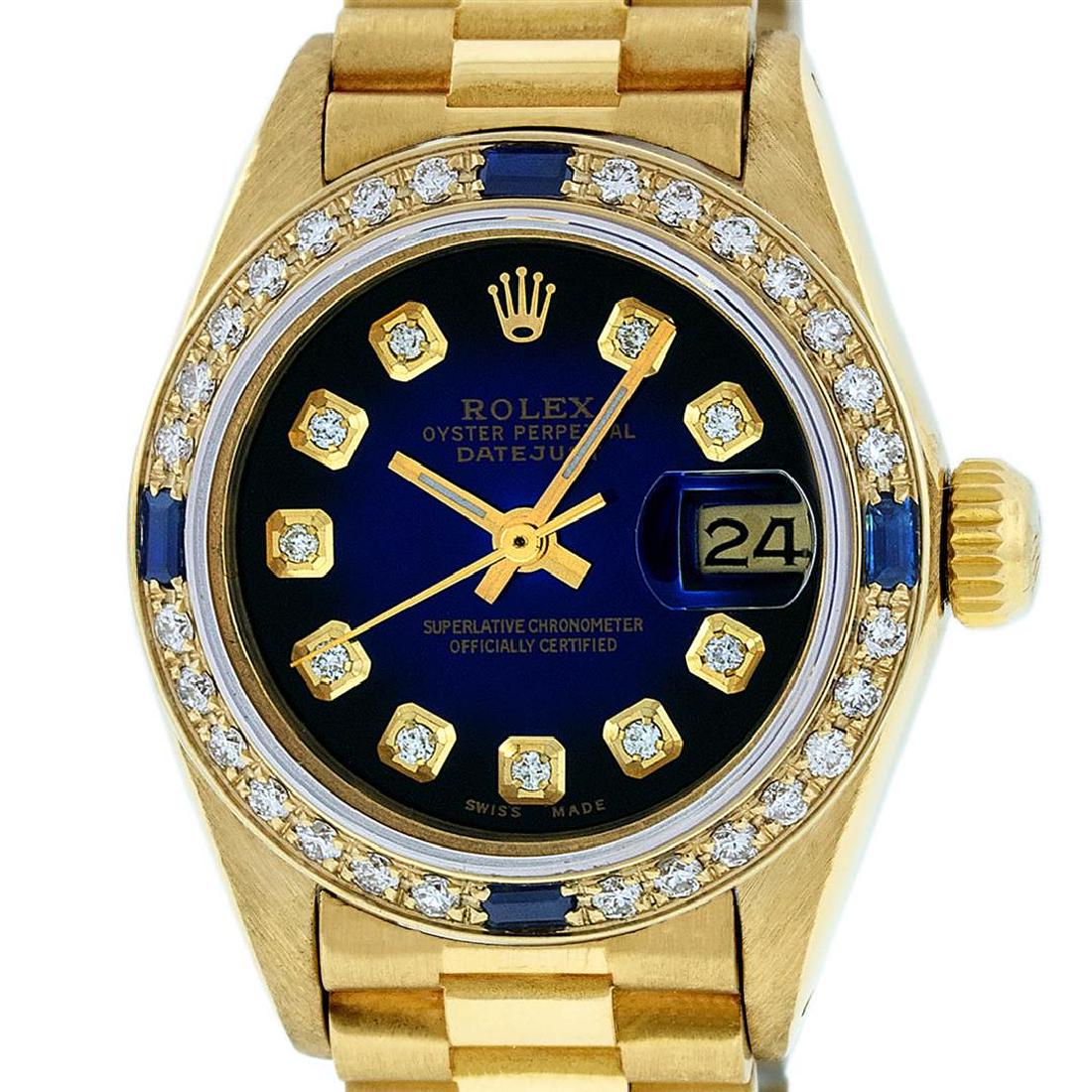 Rolex Ladies 18K Yellow Gold Sapphire And Blue Vignette: One Ladies 18K Yellow Gold Rolex President Polished, Serviced & Electronically Tested, Yellow Gold Case: 26mm, 18K Yellow Gold Crown, Custom Bezel: 18K Yellow Gold Sapphire Beadset Diamond Bezel, Diam