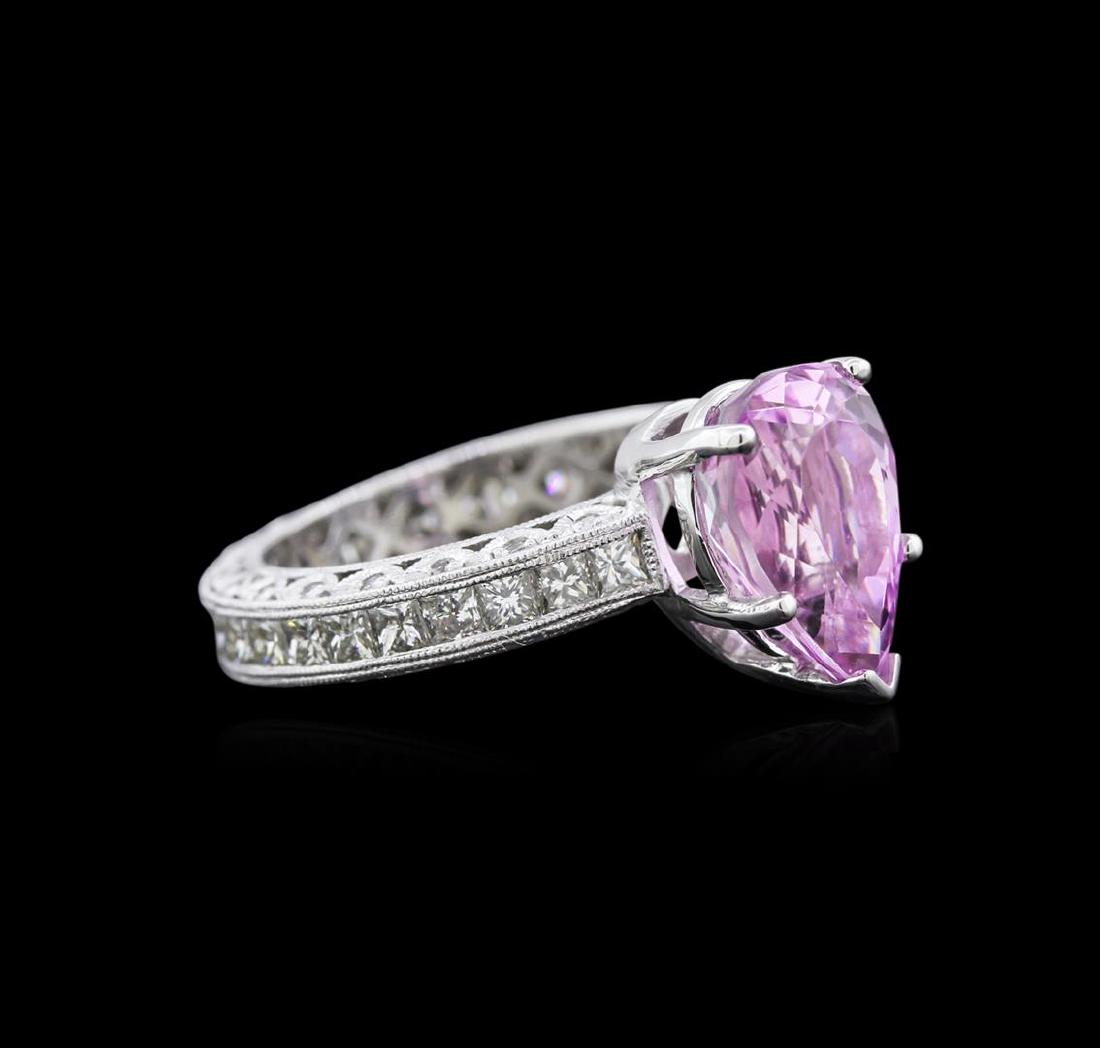 3.17 ctw Kunzite and Diamond Ring - 14KT White Gold: One electronically tested 14KT white gold ladies cast kunzite and diamond ring with a bright polish finish. Identified with markings of "14K". Condition is new. Containing: One prong set pear modified