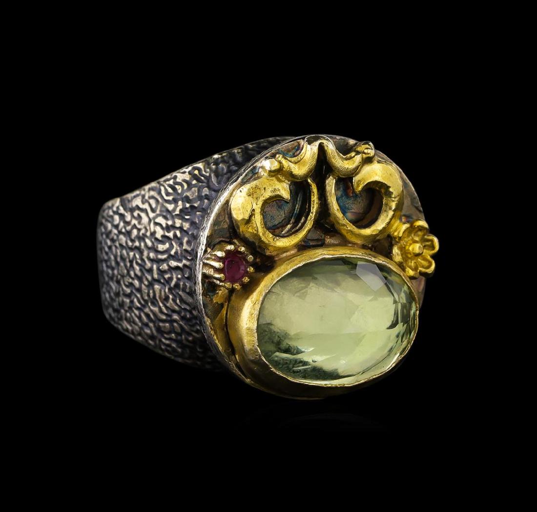 Sterling Silver Ring: One of a kind high fashion sterling silver Ring weighing 20.4 grams. Black Antique texture. Containing: Lemon Quartz, Ruby. This sterling silver promises a lasting shine.