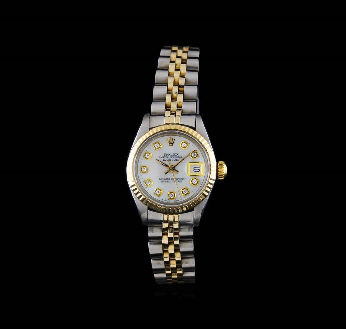 Rolex Two-Tone DateJust Ladies Watch: One ladies, hand crafted & machine milled Rolex DateJust Model wristwatch electronically tested, Stainless Steel Case: 26mm oyster, 14KT yellow gold Crown: twinlock with logo, 14KT yellow gold Bezel: 