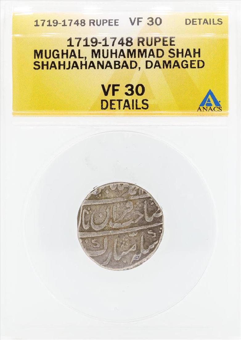 1719-1748 Rupee Mughal Muhammad Shah Shahjahanabad: One 1719-1748 Rupee Mughal Muhammad Shah Shahjahanabad Damaged Coin ANACS VF30 Details. ANACS Appraised.