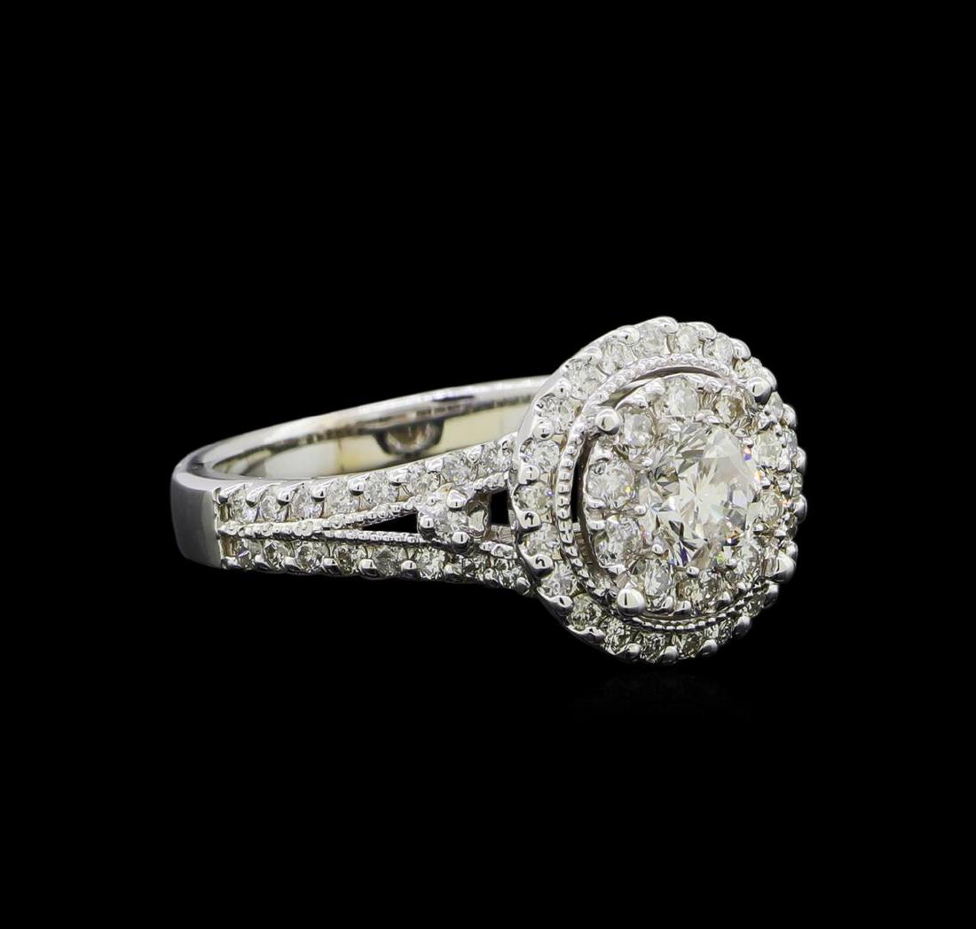 1.20 ctw Diamond Ring - 14KT White Gold: One electronically tested 14KT white gold lady's cast wedding ring with a double halo with a bright polish with milgrain detailing finish. The featured lady's ring has a shank measuring 2.63 millimete