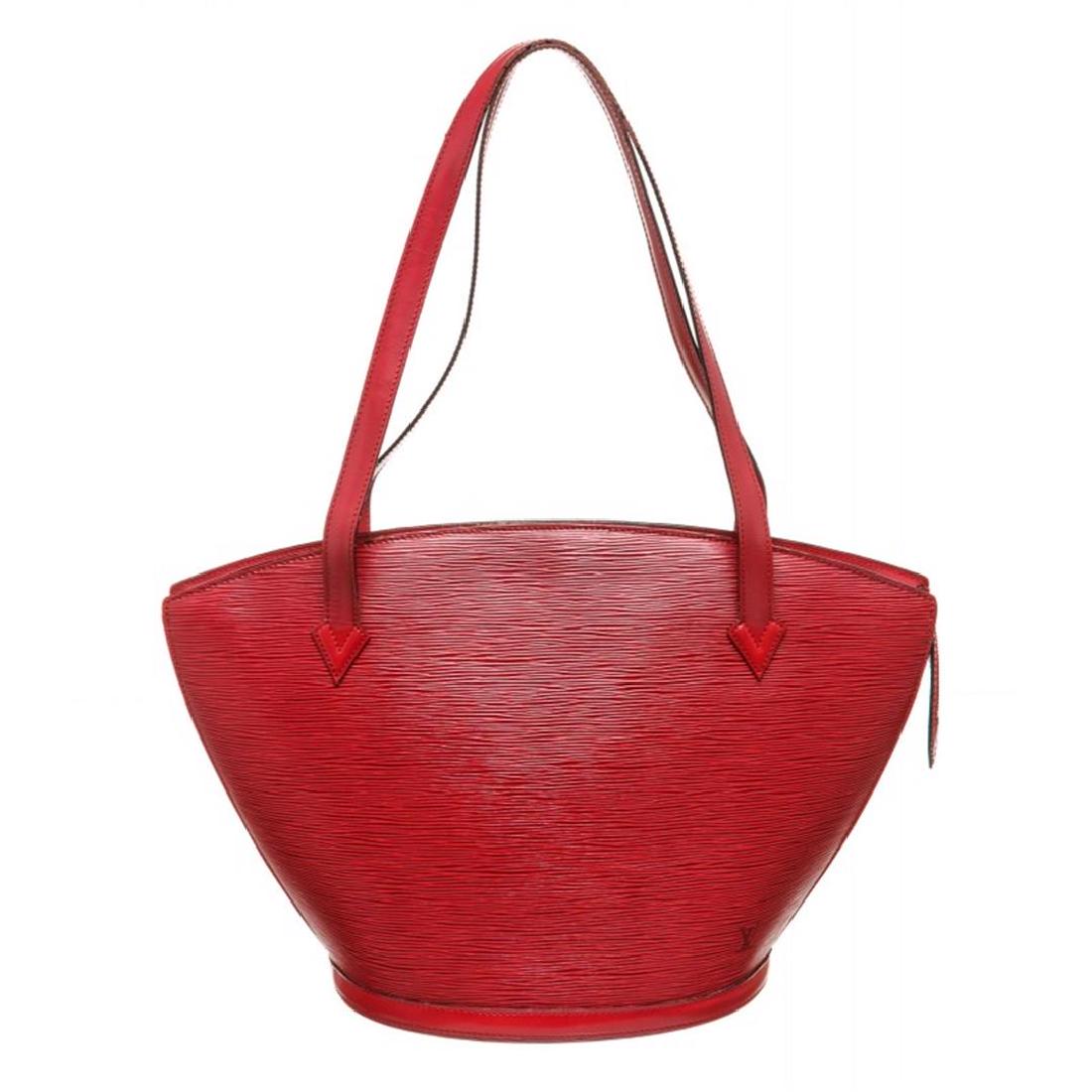 Louis Vuitton Red Epi Leather St Jacques GM Shoulder: Louis Vuitton Red Saint Jacques GM with brass hardware, tonal stitching throughout, dual flat shoulder straps, tonal Alcantara lining, single pocket with zip closure at interior wall and zip closure a