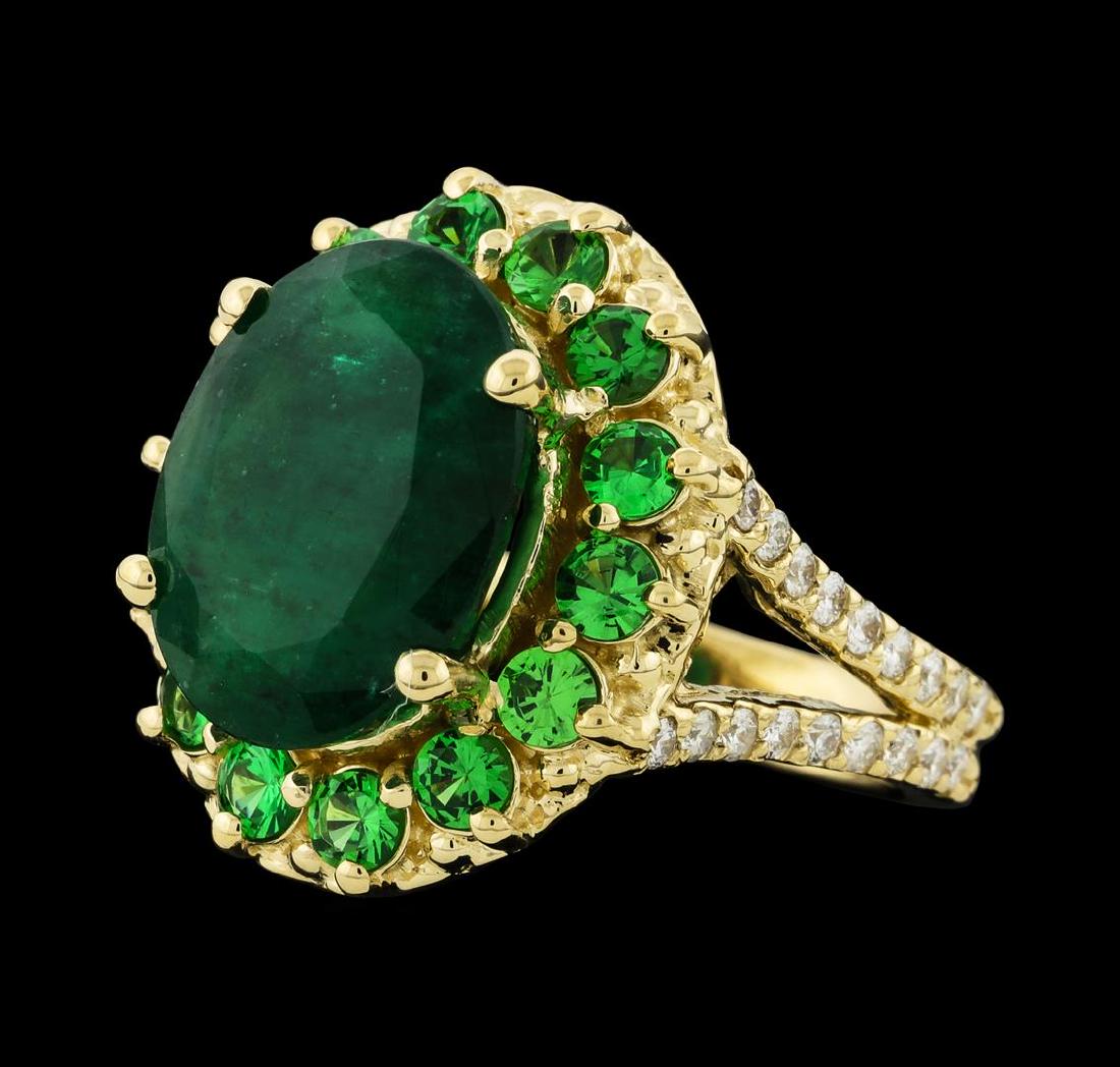 6.08 ctw Emerald, Tsavorite and Diamond Ring - 14KT: One electronically tested 14KT yellow gold lady's cast fashion ring with a split shank basket halo with a bright polish finish. The featured lady's ring has a double shank measuring 3.40 millimeters w