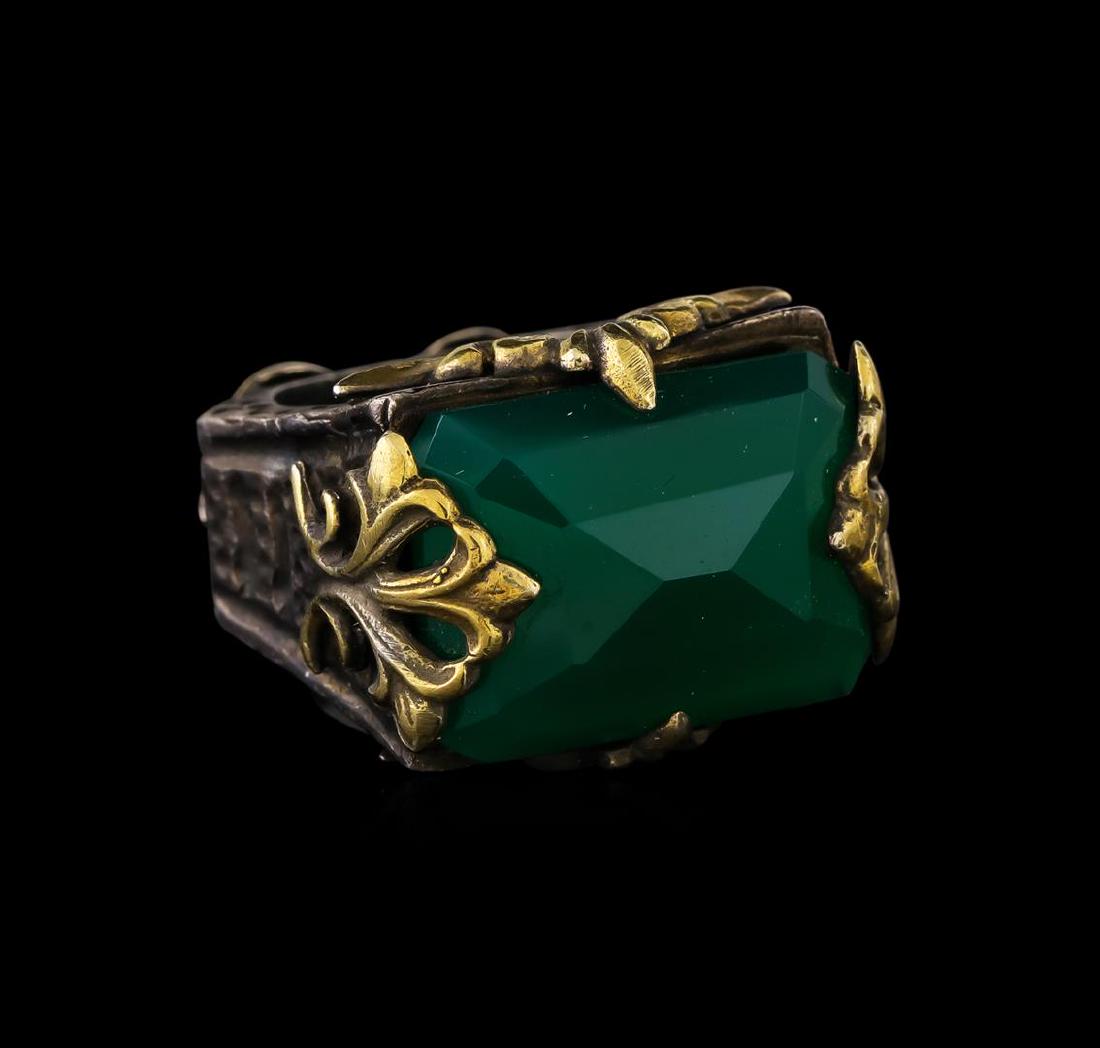 Sterling Silver Ring: One of a kind high fashion sterling silver Ring weighing 18.7 grams. Black Antique texture. Containing: Green Crystal. This sterling silver promises a lasting shine.