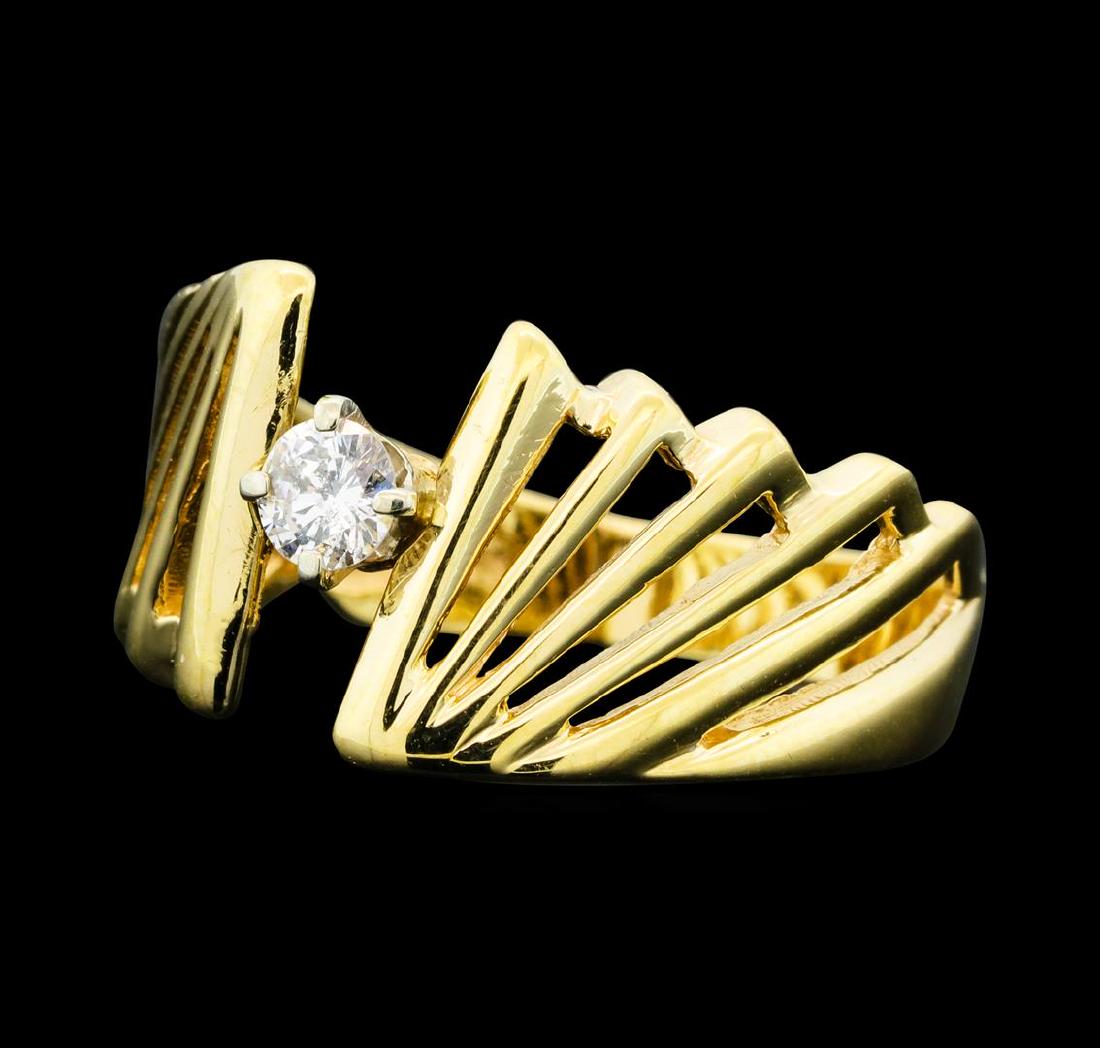 0.15 ctw Diamond Solitaire Ring - 14KT Yellow Gold: One ring featuring: 14KT yellow gold weighing 4.20 grams containing one center diamond weighing 0.15ct.