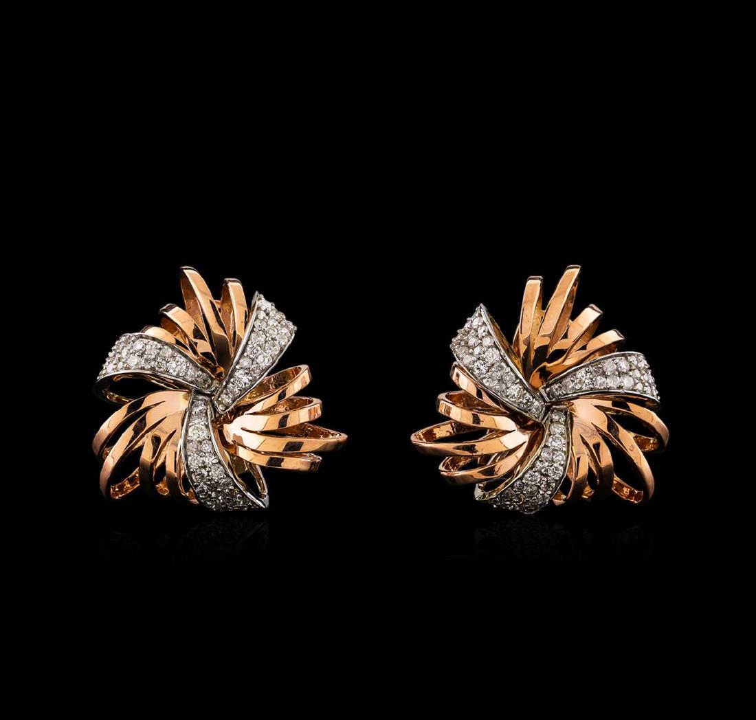 14KT Rose Gold 0.50 ctw Diamond Earrings: One pair electronically tested 14KT rose gold ladies combination cast & assembled earrings with Omega clip backs with posts with a bright polish finish. Condition is new. Identified with markings of "