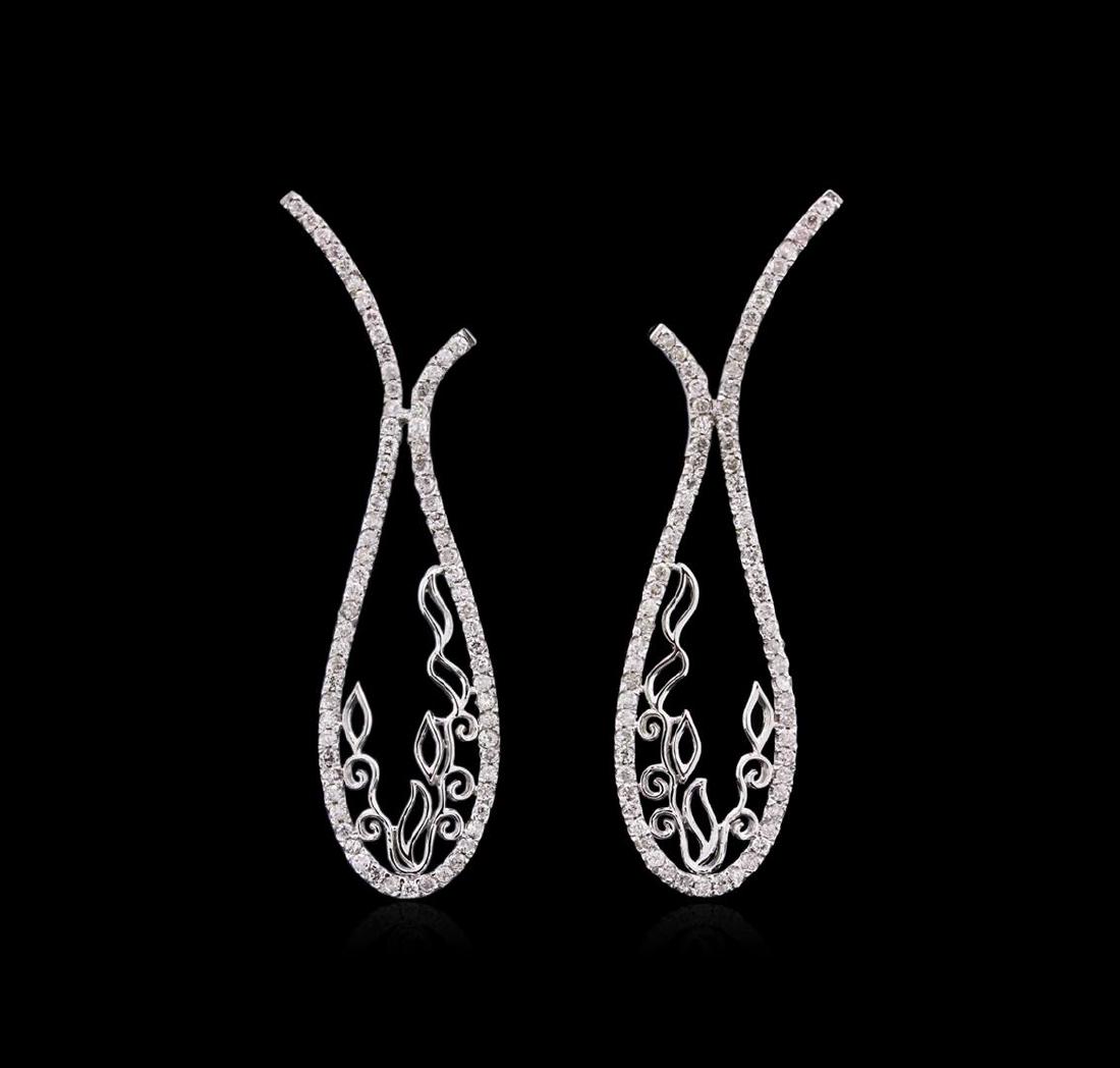 0.93 ctw Diamond Earrings - 14KT White Gold: One pair electronically tested 14KT white gold ladies cast & assembled diamond dangle earrings with standard backs. Bright polish finish. Identified with markings of "585". Condition is new, good work
