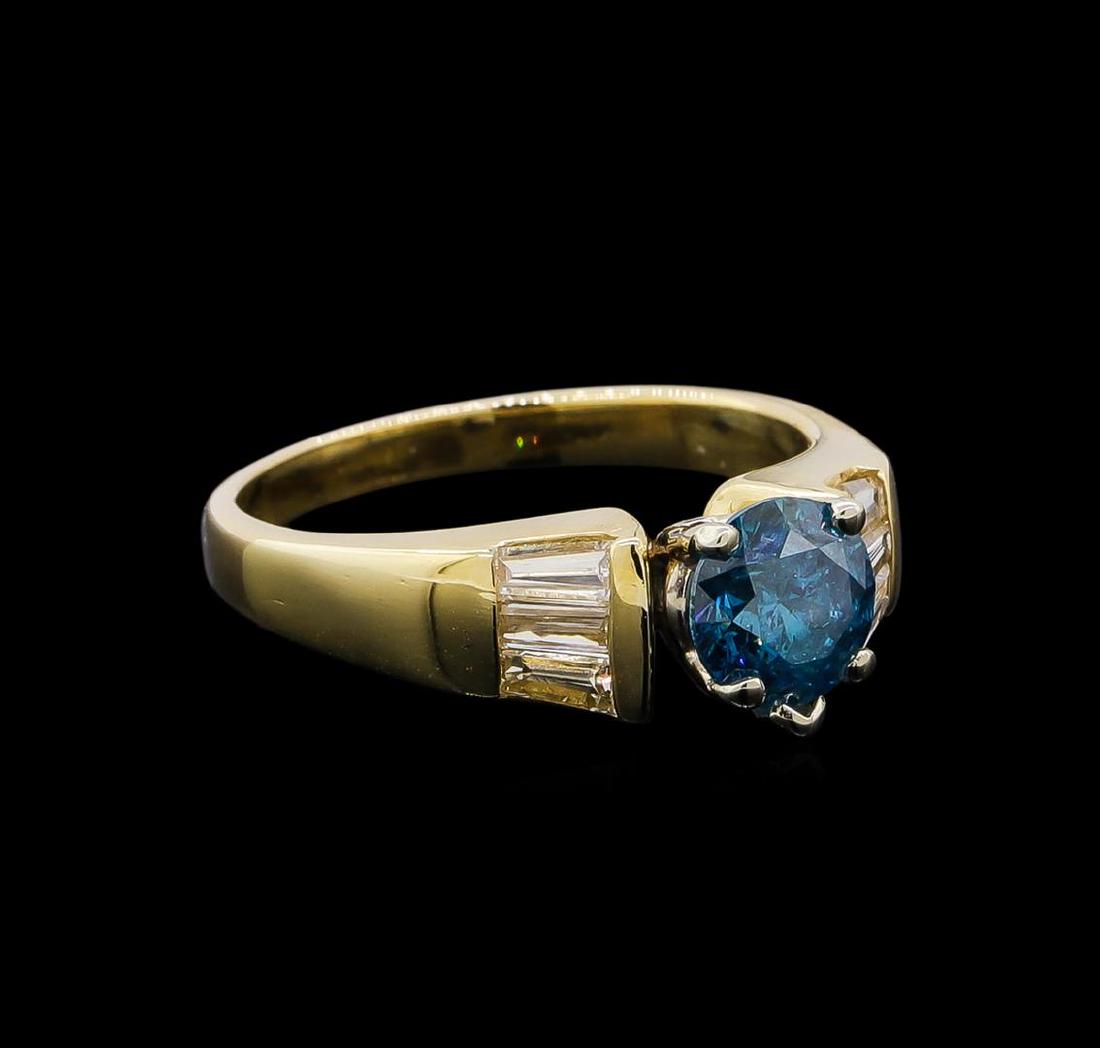 0.74 ctw Blue Zircon and Diamond Ring - 14KT Yellow: One ring : 14KT yellow gold weighing 3.35gm containing one blue zircon with a total weight of 0.74ct and diamonds weighing 0.4ctw.