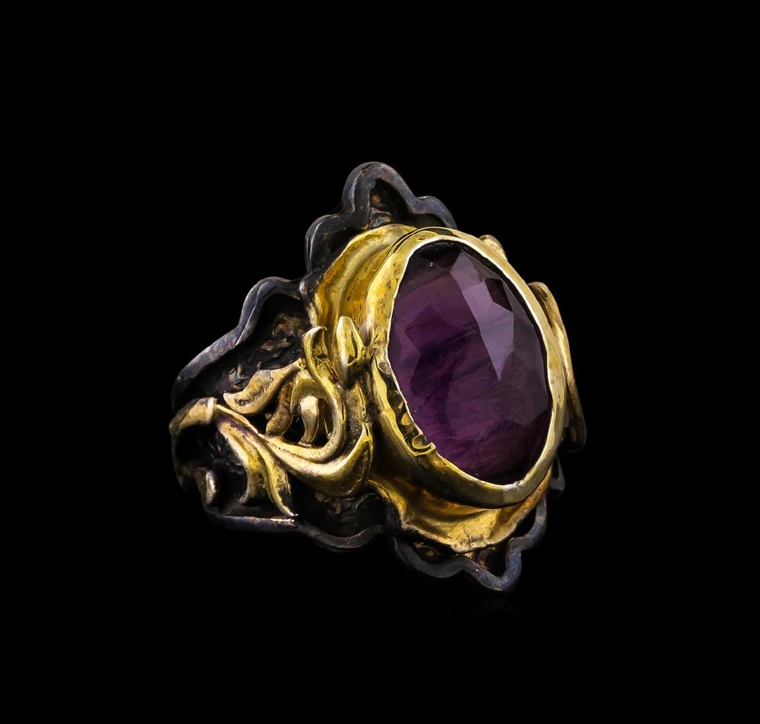 Sterling Silver Ring: One of a kind high fashion sterling silver Ring weighing 17.7 grams. Black Antique texture. Containing: Amethyst. This sterling silver promises a lasting shine.