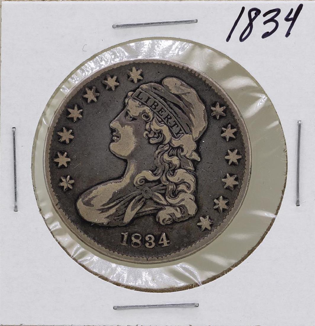 1834 Capped Bust Half Dollar Coin: One 1834 Capped Bust Half Dollar Coin.