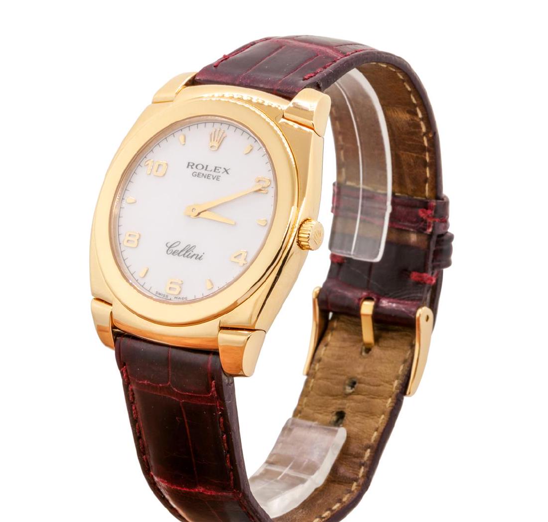 Rolex Men's Cellini Wristwatch - 18KT Rose Gold: One men's Rolex Cellini 18KT rose gold wristwatch with an attached reddish brown leather strap. The watch has been electronically tested and is stamped 18K. Model #: 5330. Serial #: A998657. Crown: fl
