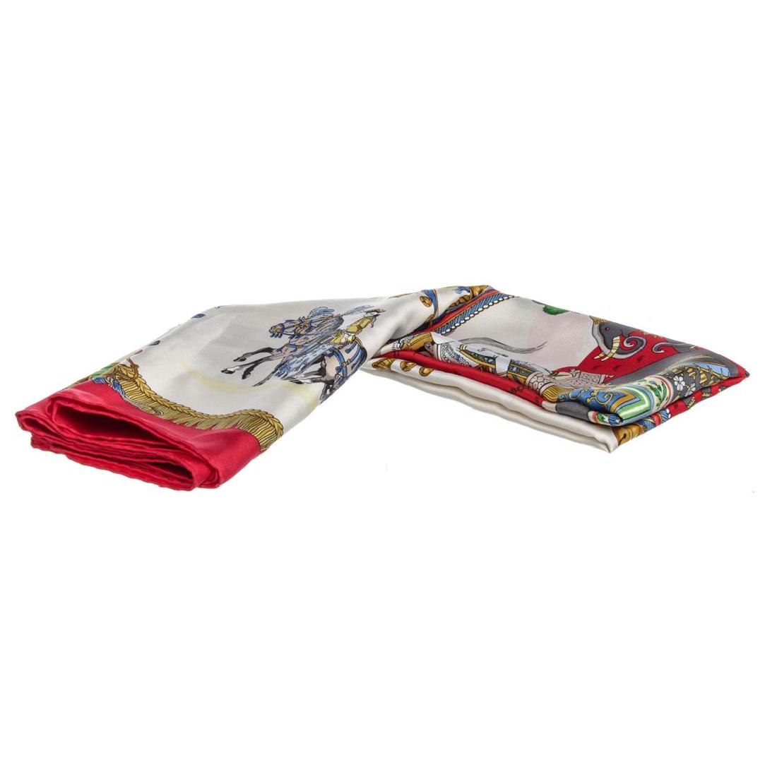 Hermes Red White Multicolor Caparacons De La France Et: Hermes red white multicolor Caparacons De La France Et De L'Inde silk scarf with elephant horses and soldier print designed by Philippe Ledoux, hand rolled edges. Please note 1.5"x3.5" stain on corner