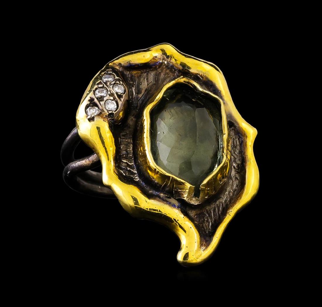 Sterling Silver Ring: One of a kind high fashion sterling silver Ring weighing 11.9 grams. Black Antique texture. Containing: Green Quartz, White Crystal. This sterling silver promises a lasting shine.