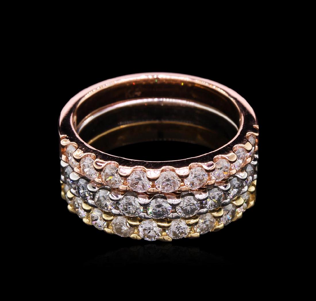 1.65 ctw Diamond Stackable Rings - 14KT Tri-Color Gold: One set electronically tested 14KT yellow, white, and rose gold lady's cast stackable rings with a bright polish finish. The featured lady's ring set has a triple shank measuring 8.15 millimeters wide