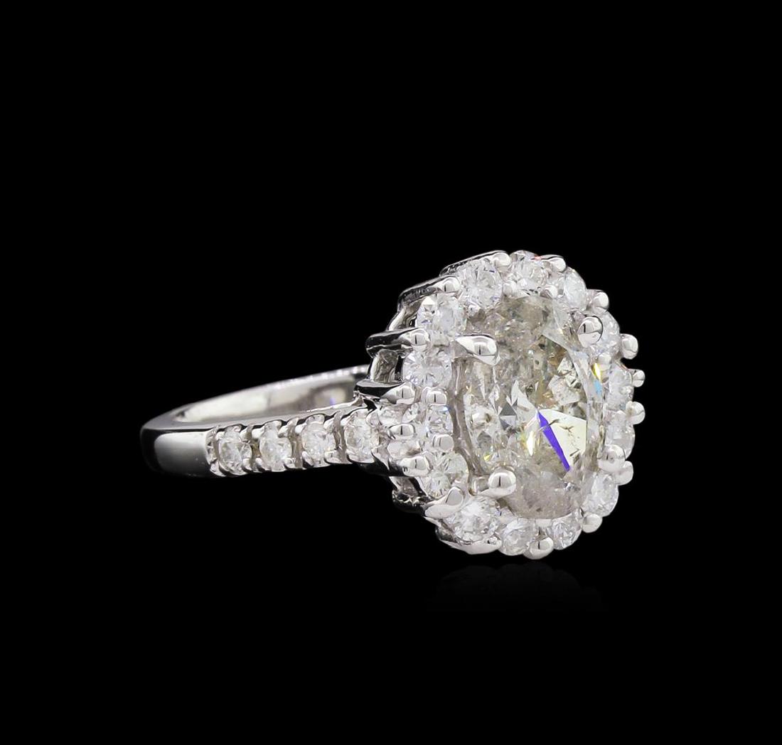 2.77 ctw Diamond Ring - 14KT White Gold: One electronically tested 14KT white gold lady's cast wedding ring with a basket halo with a bright polish finish. The featured lady's ring has a shank measuring 2.01 millimeters wide. Identified with