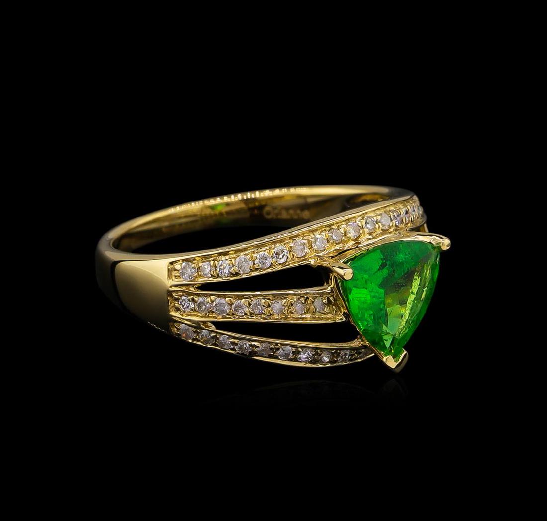 1.17 ctw Tsavorite and Diamond Ring - 14KT Yellow Gold: One electronically tested 14KT yellow gold lady's cast fashion ring with a three row wide band with a bright polish finish. The featured lady's ring has a shank measuring 2.18 millimeters wide. Tradem