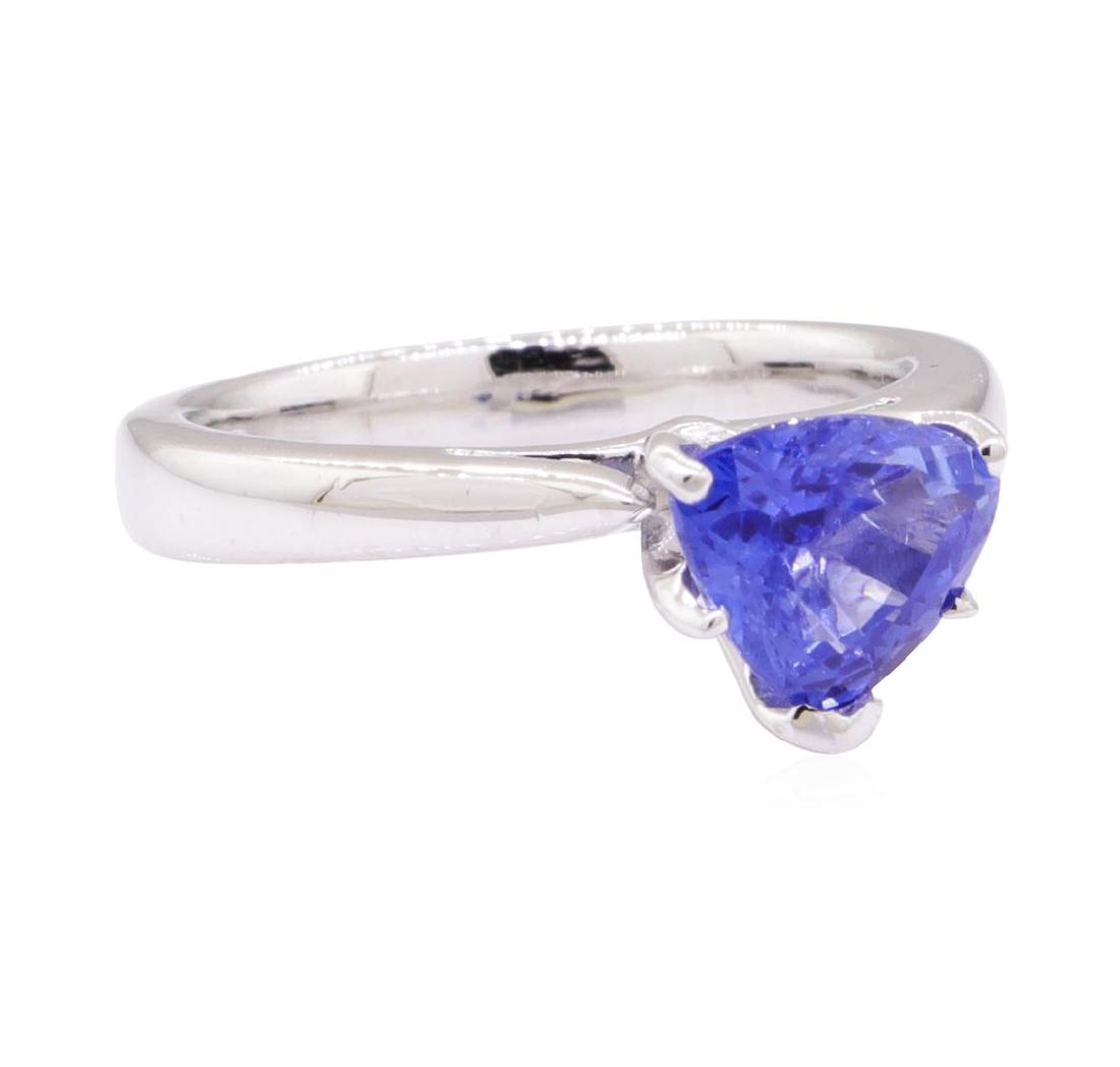 1.81 ctw Blue Sapphire Ring - Platinum: One ring featuring: platinum weighing 7.1 grams containing one trilliant cut blue sapphire weighing 1.81ct. The ring has a pinched solitaire motif.
