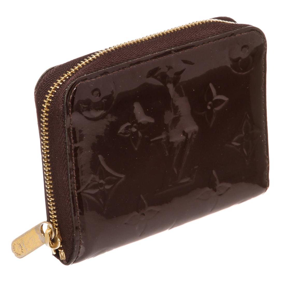 Louis Vuitton Amarante Vernis Leather Zippy Coin Purse: Purple Amarante monogram debossed Vernis patent leather Louis Vuitton Zippy Coin Purse compact wallet with gold-tone hardware, tonal leather lining, dual interior compartments, seven card slots at int