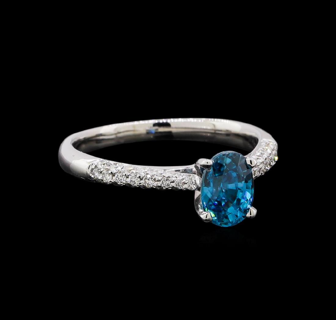 1.22 ctw Blue Zircon and Diamond Ring - 18KT White Gold: One ring : 14KT white gold weighing 3.25gm containing one blue zircon with a total weight of 1.22ct and diamonds weighing 0.5ctw.