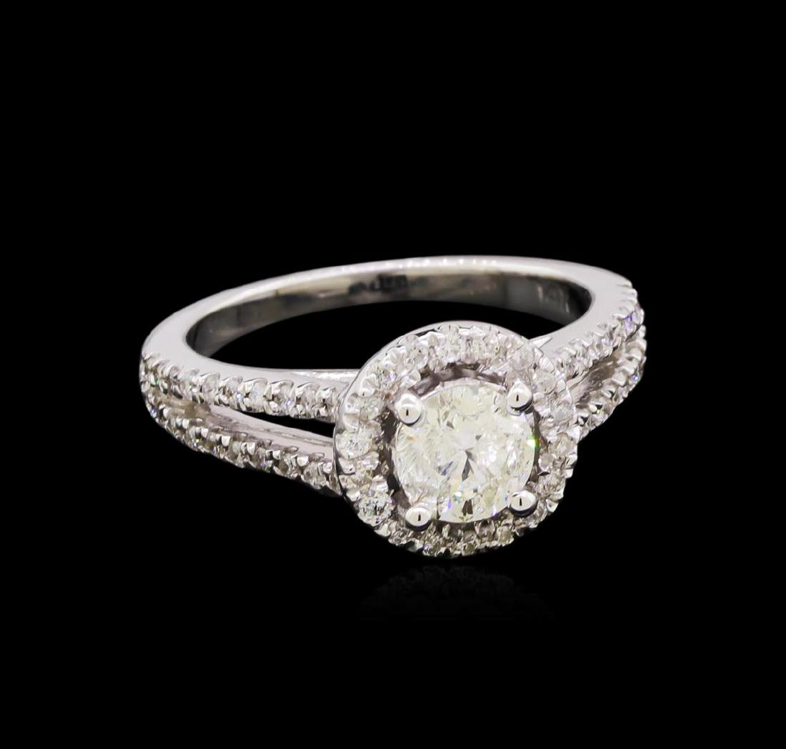 1.13 ctw Diamond Ring - 14KT White Gold: One electronically tested 14KT white gold lady's cast wedding ring with a split shank basket halo with a bright polish finish. The featured lady's ring has a shank measuring 1.85 millimeters wide. Ide