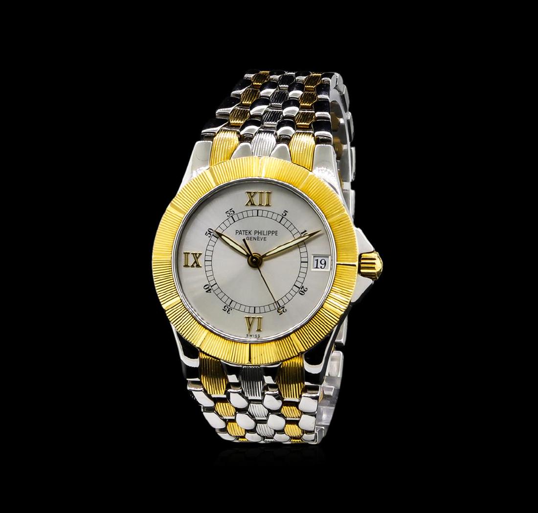 Patek Philippe 18KT Two-Tone Neptune Watch: One, Patek Philippe Neptune wristwatch electronically tested, Stainless Steel Case: 36mm diameter, 18KT yellow gold Bezel: fluted, with raised hour markers, 18KT Yellow gold Crown: scalloped, high rel