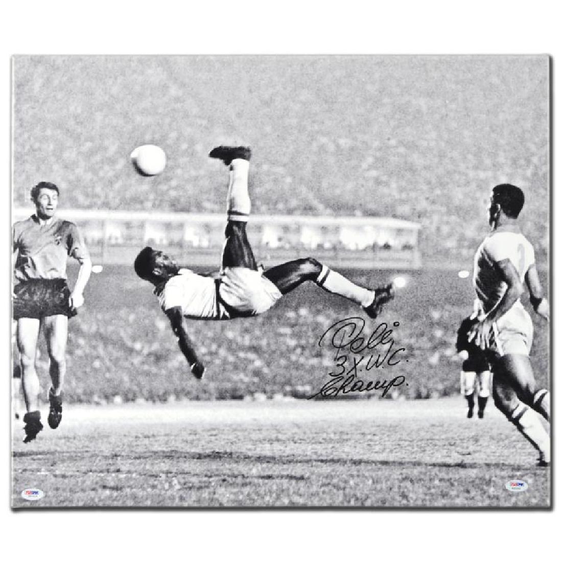Scissor Kick (Pele) by Pele: "Scissor Kick" is a gallery wrapped print on canvas that is autographed by legendary Brazilian footballer, Pele! This piece was authenticated by PSA/DNA, which authenticates sports memorabilia using p