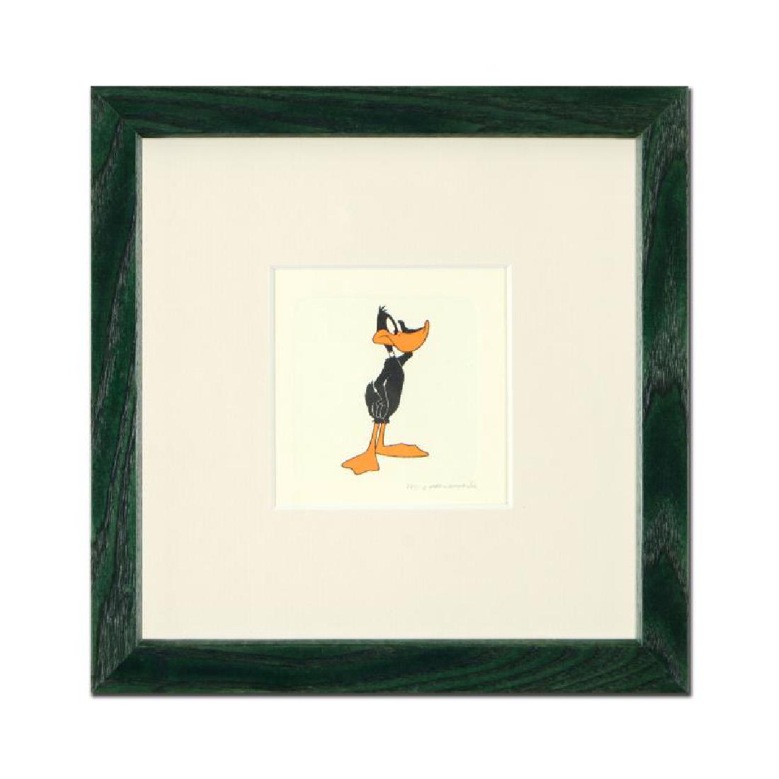 Daffy Duck (Looking to the Side) by Looney Tunes: "Daffy Duck (Looking to the Side)" is a limited edition etching on paper with hand-tinted coloring from Warner Bros, numbered and dated 1999. This piece comes framed. Measures approx. 9" x 9" (with fr