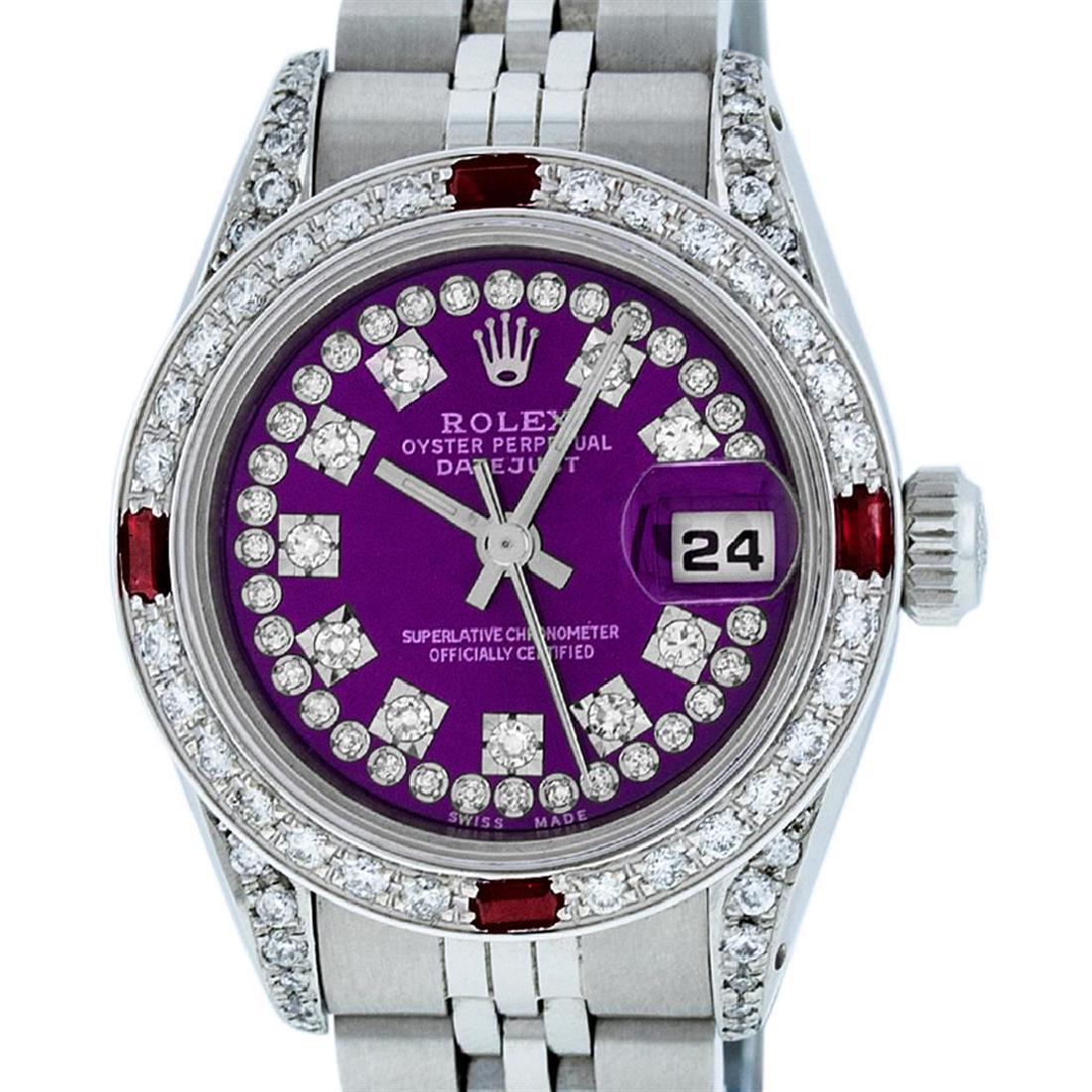Rolex Ladies Stainless Steel 26MM Purple String Diamond: One Ladies Stainless Steel Rolex Datejust Polished Bright with Satin Finish, Serviced & Electronically Tested, Stainless Steel Case: 26mm, Stainless Steel Crown, Diamond Lugs: 24 Diamonds On Lugs, Cla