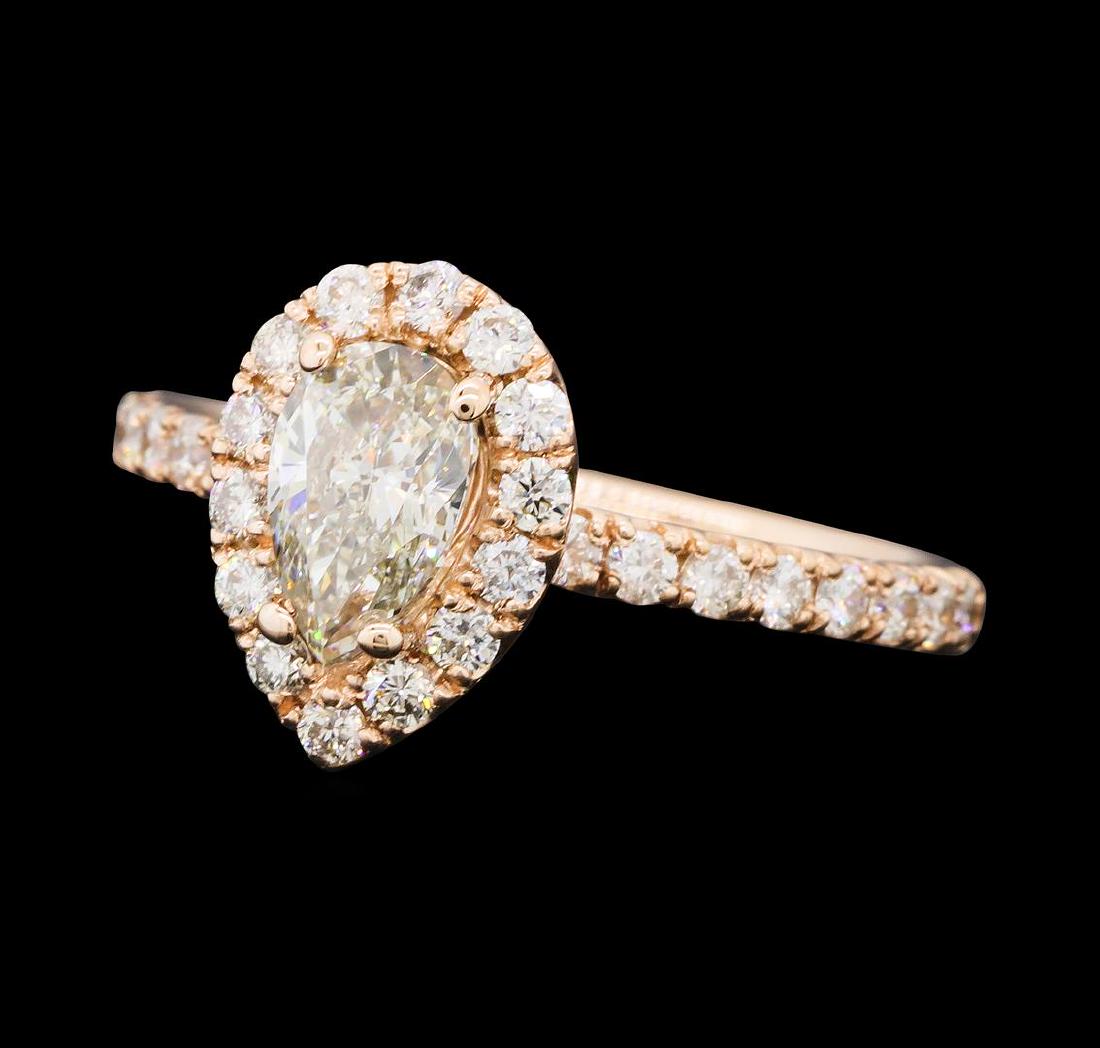 1.18 ctw Diamond Ring - 14KT Rose Gold: One electronically tested 14KT rose gold lady's cast wedding ring with a basket halo with a bright polish finish. The featured lady's ring has a shank measuring 1.77 millimeters wide. Identified with 