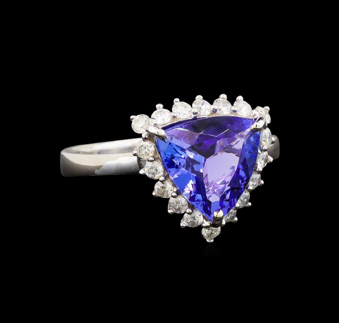 14KT White Gold 3.30 ctw Tanzanite and Diamond Ring: One electronically tested 14KT white gold ladies cast tanzanite and diamond ring with a flat shank with a bright polish finish. Trademark is Orianne. Identified with markings of "14K". Condition is ne