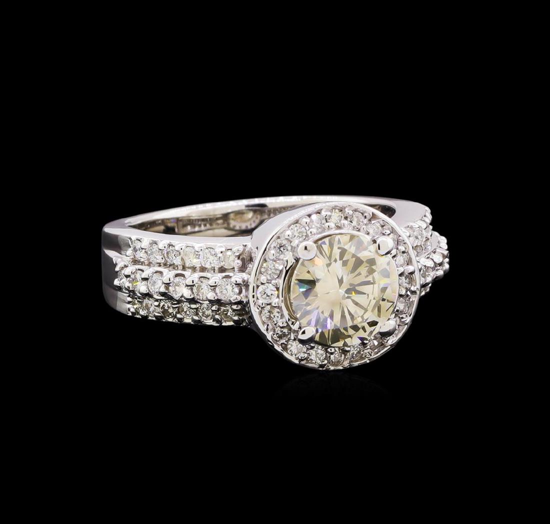 2.25 ctw Diamond Ring - 14KT White Gold: One electronically tested 14KT white gold lady's cast halo wedding ring with a 3 row with a bright polish finish. Featured lady's ring has a shank measuring 3.40 millimeters in width. Identified with 