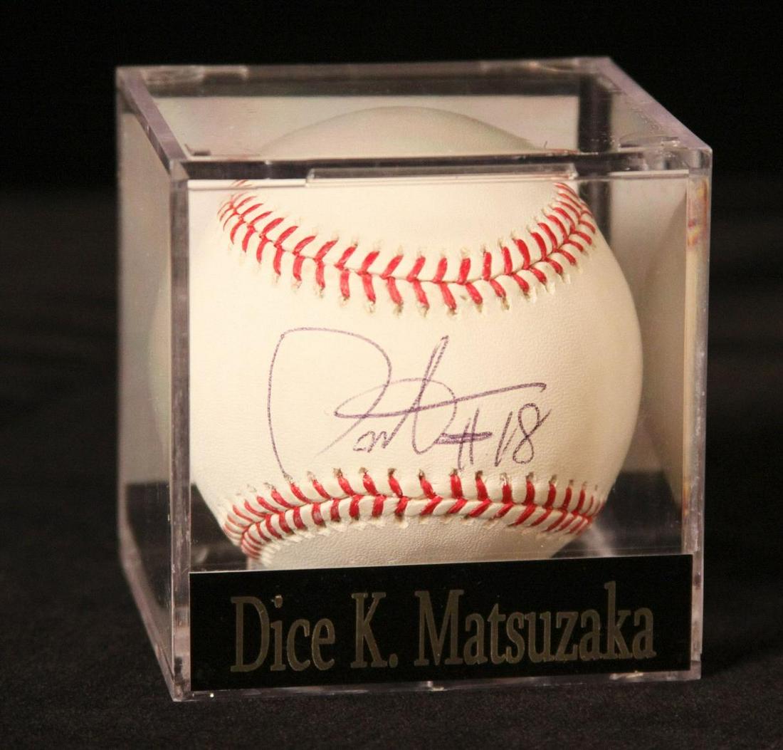 Dice K. Matsuzaka Autographed Baseball: One baseball signed by pitcher, Dice K. Matsuzaka. Comes with case and a certificate of authenticity.