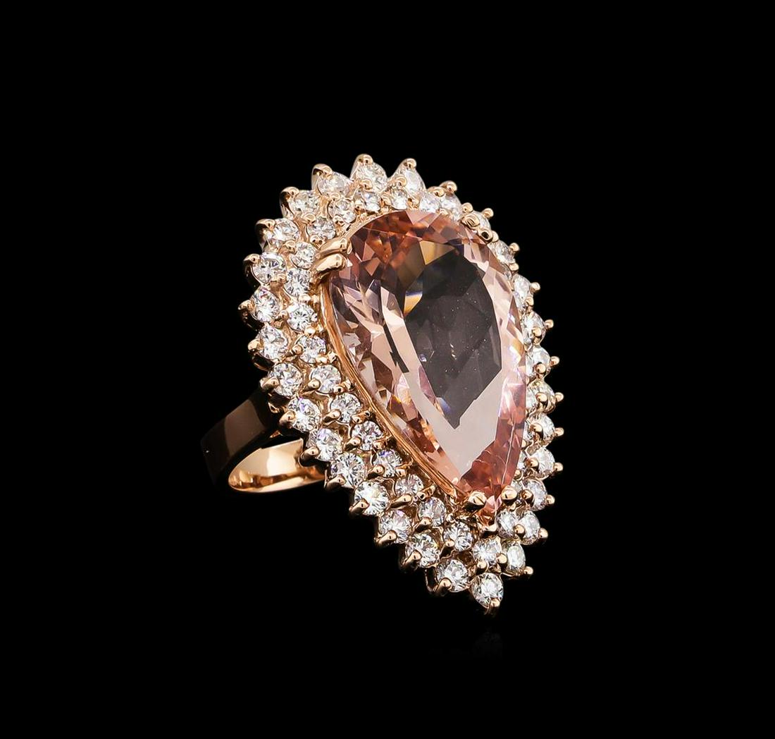 12.50 ctw Morganite and Diamond Ring - 14KT Rose Gold: One electronically tested 14KT rose gold lady's cast fashion ring with a double basket halo with a bright polish finish. The featured lady's ring has a shank measuring 3.44 millimeters wide. Identifie