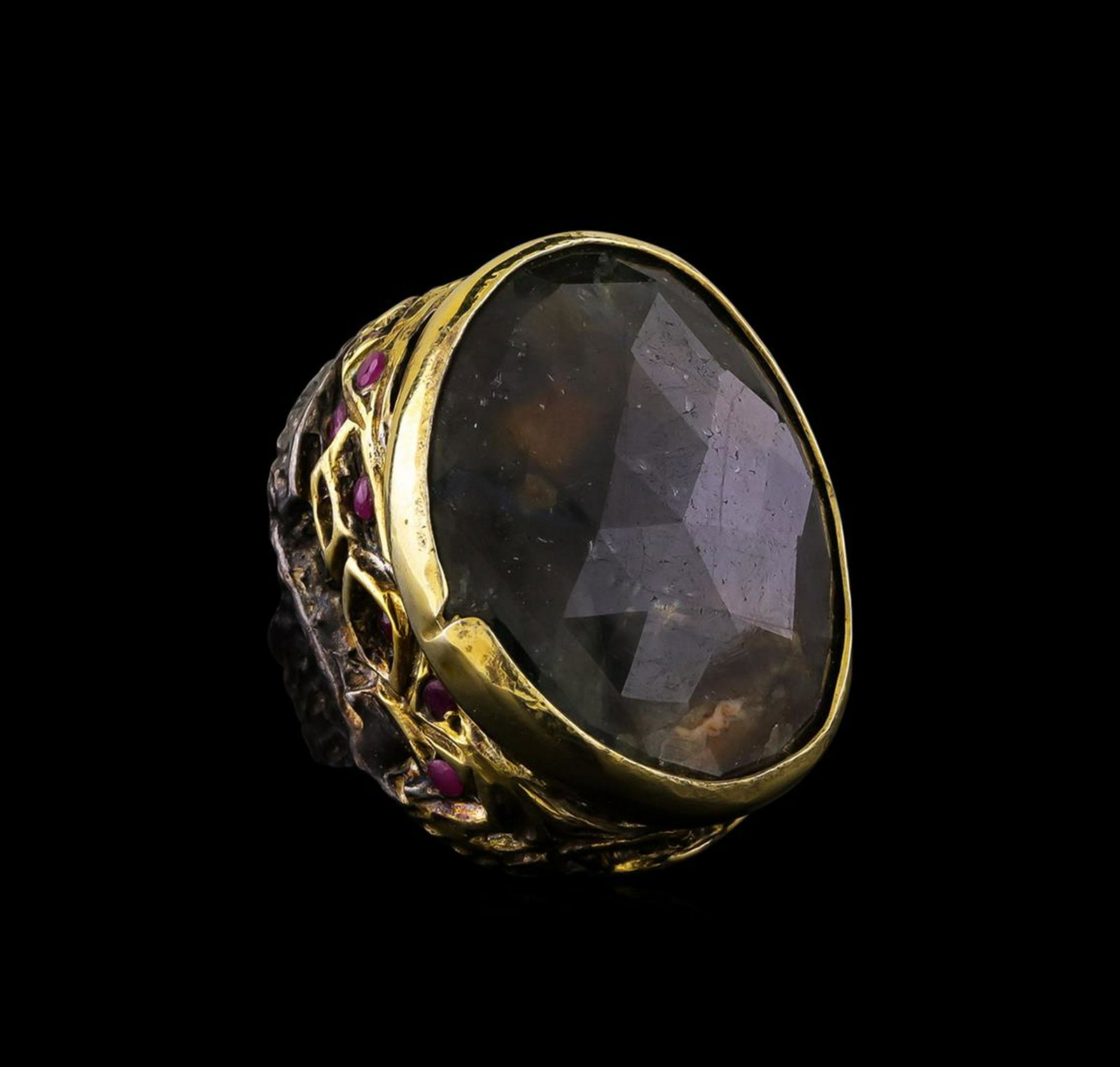 Sterling Silver Ring: One of a kind high fashion sterling silver Ring weighing 36.8 grams. Black Antique texture. Containing: Corundum, Ruby. This sterling silver promises a lasting shine.
