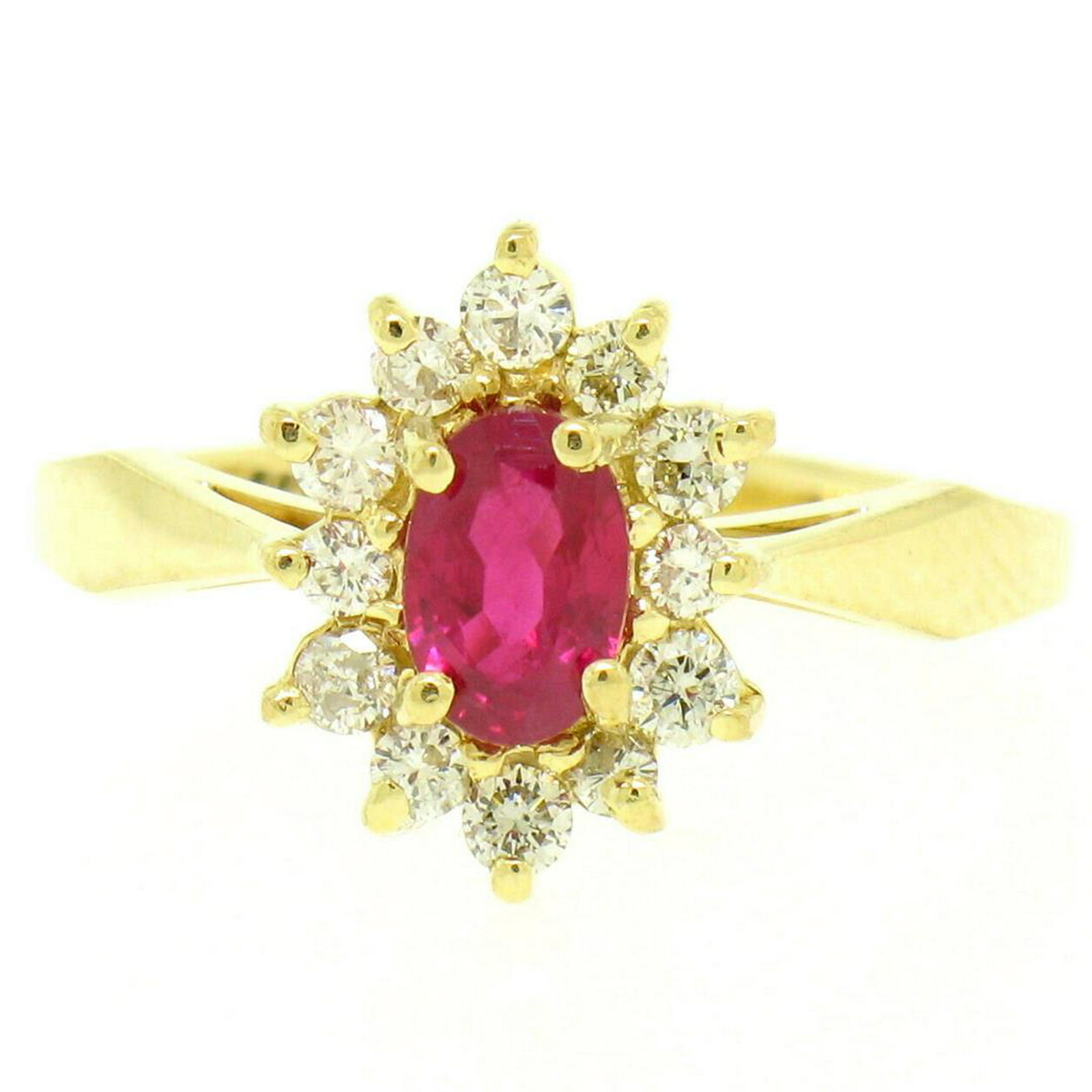 18k Yellow Gold 0.95 ctw Oval Ruby Solitaire & Round: One 18k Solid Yellow Gold 0.95ctw Oval Ruby Solitaire & Round Diamond Halo Ring . Item Details : Material: 18k Solid Yellow Gold , Weight: 3.50 Grams , Stone(s): (1) Natural Genuine Ruby - Oval Cut - 