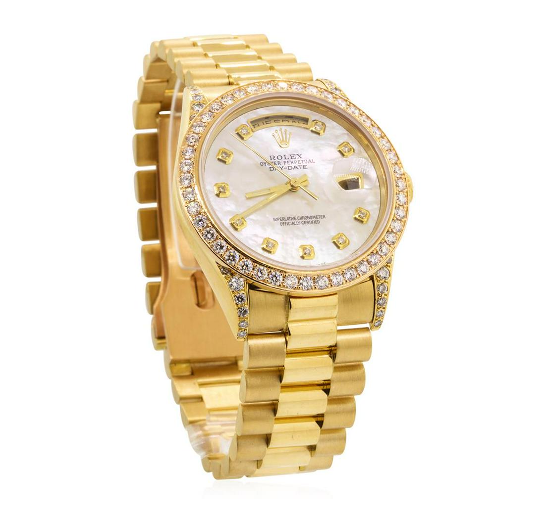 Rolex Men's President Wristwatch - 18KT Yellow Gold: One men's Rolex President Day/Date Quickset 18KT yellow gold wristwatch with an attached 18KT yellow gold custom bracelet. The watch has been electronically tested and is stamped 18K/750. Serial #: L5