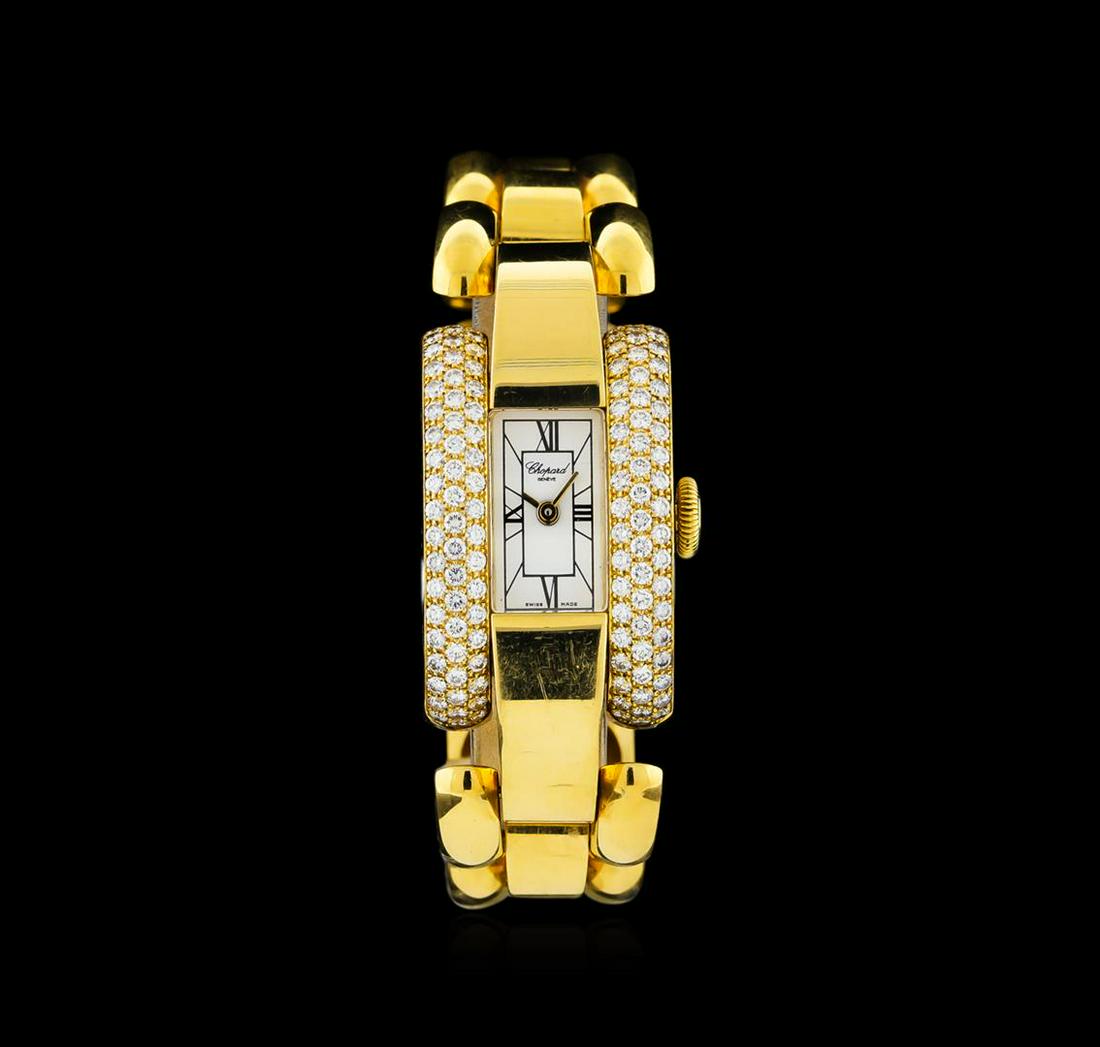 Chopard 18KT Gold 1.75 ctw Diamond La Strada Ladies: One ladies, Chopard La Strada diamond wrist watch electronically tested 18KT yellow gold, Case: 30 x 18mm, tank style, Case Back: secured by four set screws, engraved with the manufacturers ID numbers