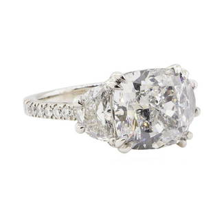 7.89 ctw GIA Certified Platinum Diamond Ring: One electronically tested platinum lady's custom CAD/CAM 3-stone wedding ring with a cathedral shank and a bright polish finish. Condition is NEW, good workmanship. The featured lady's ring has a shan