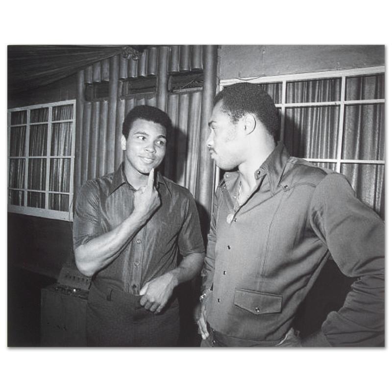 Muhammad Ali Photo with Ken Norton by Ali, Muhammad: Own a piece of sports history with this Muhammad Ali and Ken Norton photo. Taken at the peak of his fame as one of the greatest heavyweight championship boxers of all time, this photo is sure to compl
