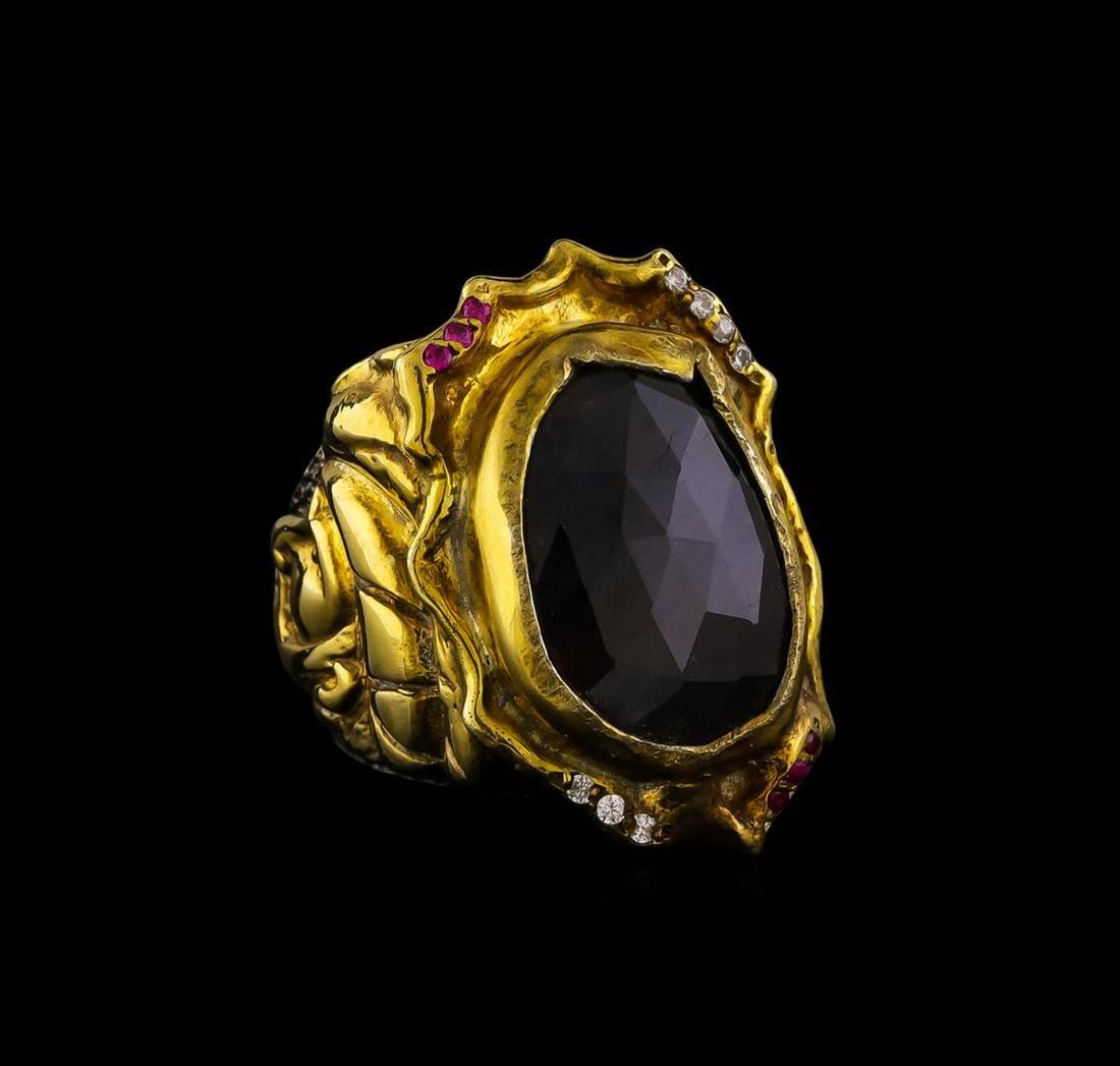 Sterling Silver Ring: One of a kind high fashion sterling silver Ring weighing 15.7 grams. Containing: Corundum, Synthetic Ruby, White Crystal. This sterling silver promises a lasting shine.